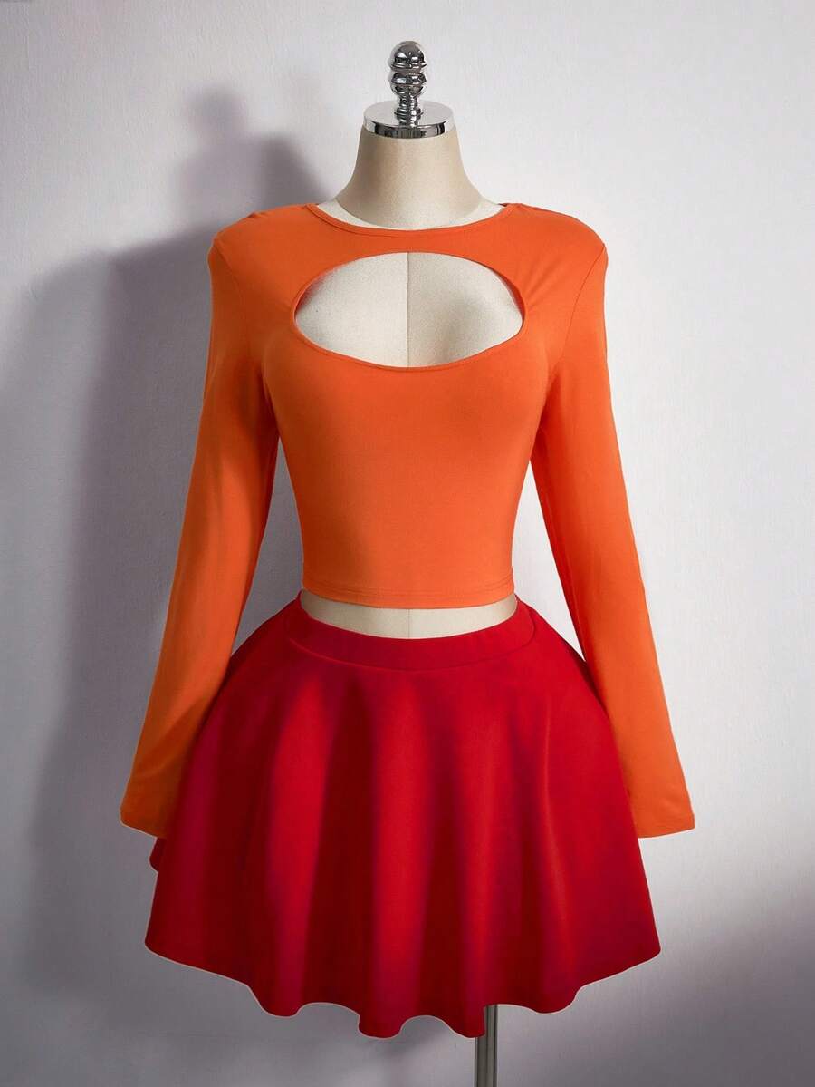 Disfraz Velma, top naranja y falda roja