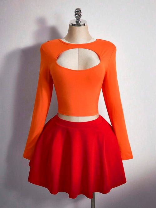 Disfraz Velma, top naranja y falda roja