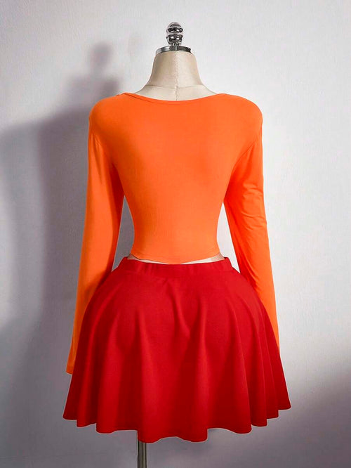 Disfraz Velma, top naranja y falda roja